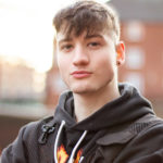 Natural light outdoor male dancer headshot