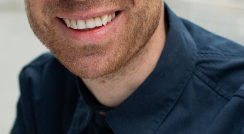 Portrait of a white man smiling. Outdoor portrait photoshoot in Birmingham U.K.