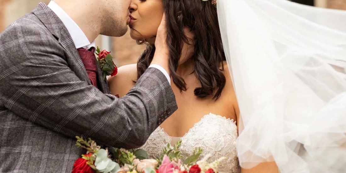 Bride and groom first kiss, Rowton Castle wedding photography