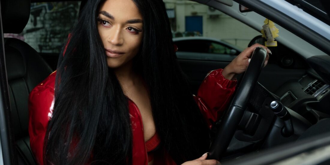 Commercial portrait of a Birmingham musician and rapper Tafara Ellie in the car. Commercial photographer Birmingham, Portrait photographer in Birmingham UK, music promo photography