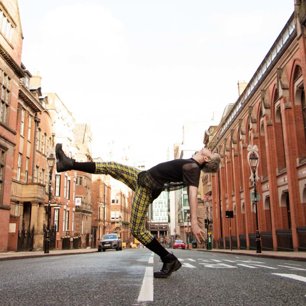 Birmingham U.K. dance photography. Male dancer dancing in the street