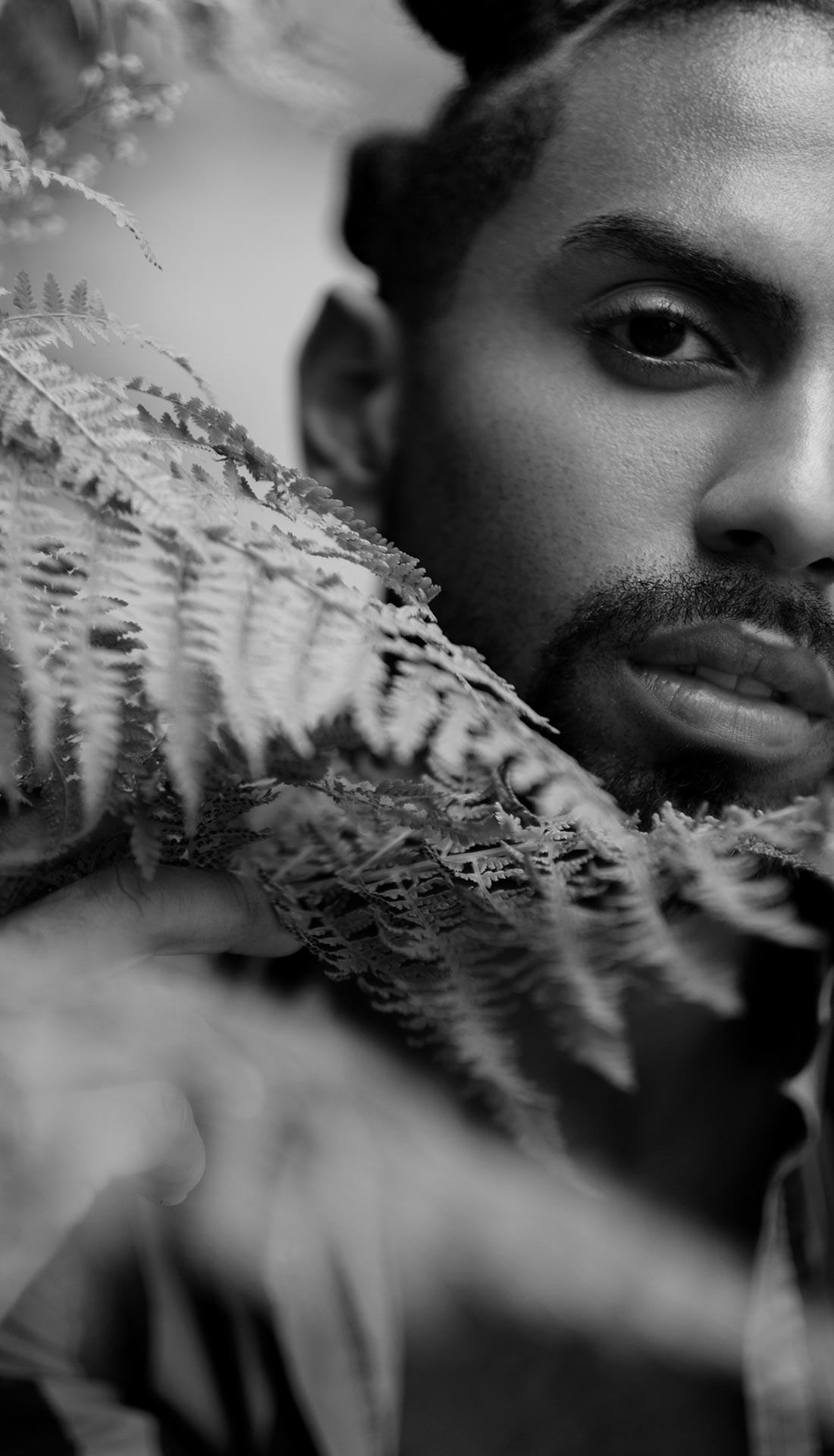 creative black and white portrait of a professioanl roller skater, dancer and model Johnny Montero