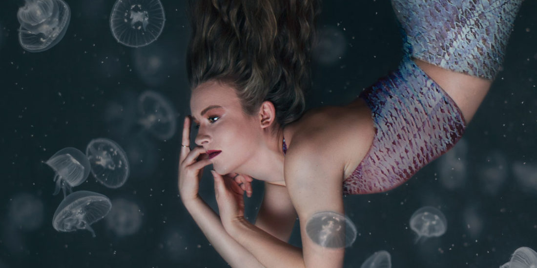 Underwater portrait, mermaid surrounded by jellyfish. Fine art photography, fine art portraits, fine art photo prints.