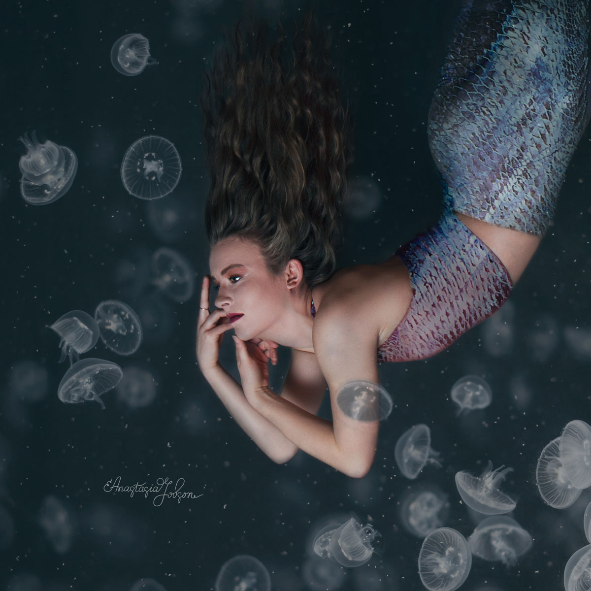 Underwater portrait, mermaid surrounded by jellyfish. Fine art photography, fine art portraits, fine art photo prints.