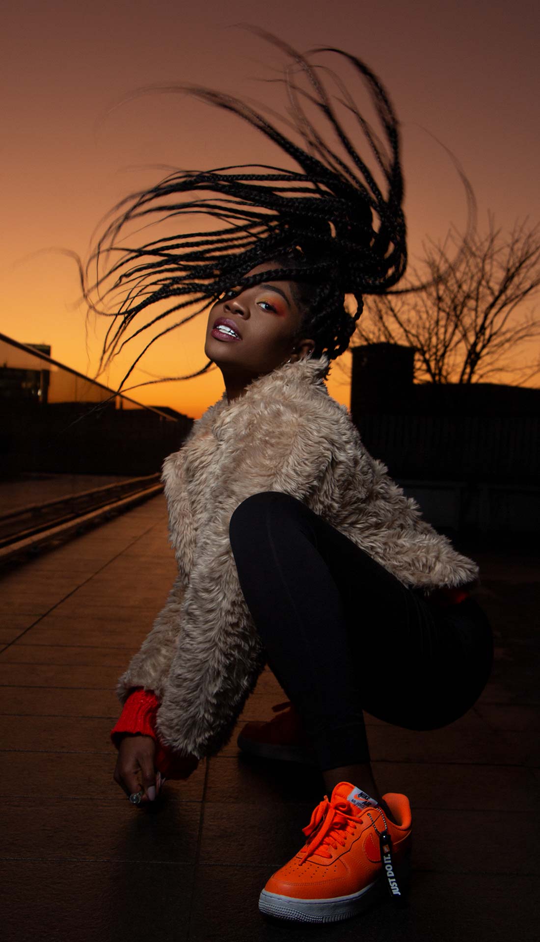 Outdoor fashion photoshoot in Birmingham UK, Nike SB orange shoes, hair flick dance pose, dance photography Birmingham, Fashion photography Birmingham and West Midlands