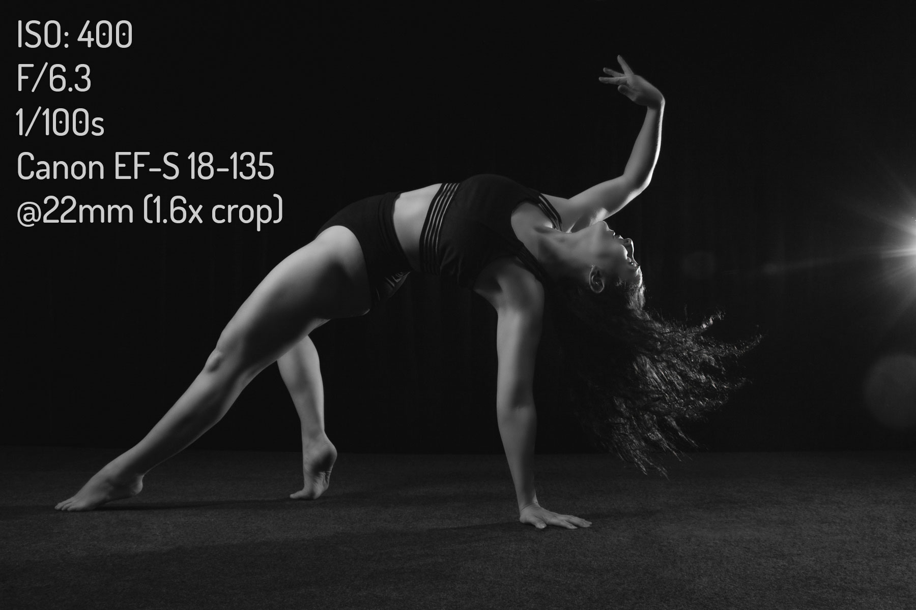 Black and white image of contemporary dancer Jessica with camera and settings information