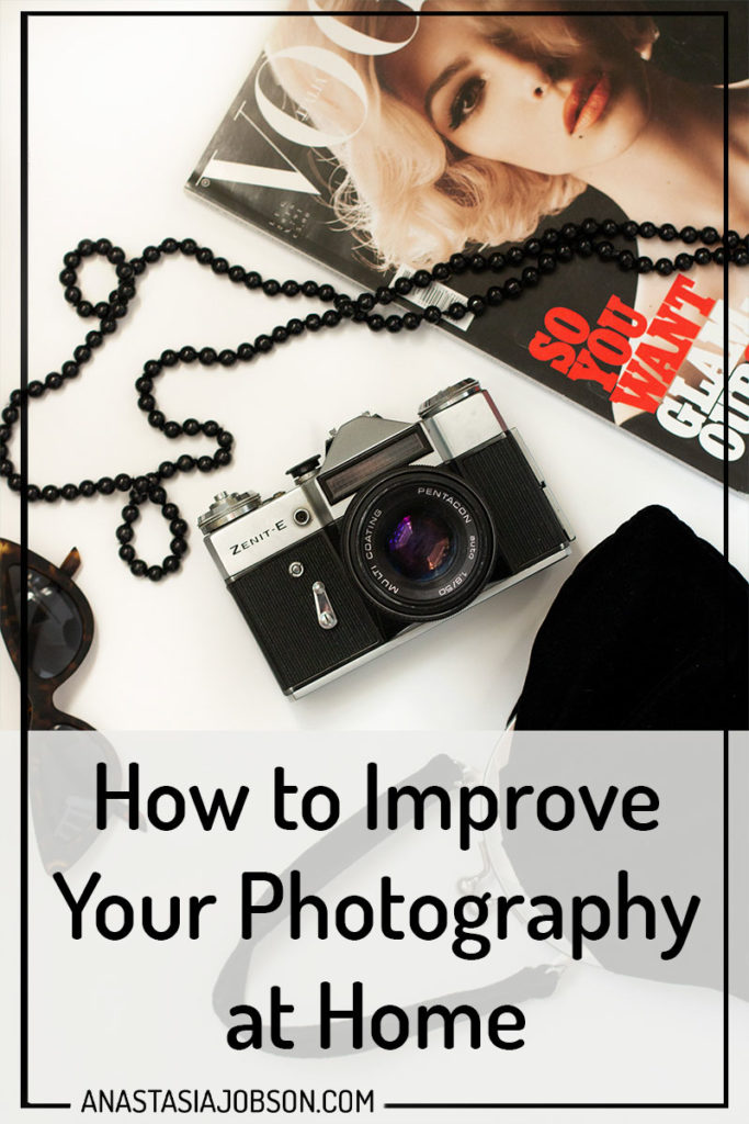 Flatlays are great to improve your photography at home. Film camera, Vogue Magazine and vintage accessories on white background