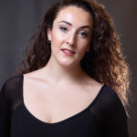 Female dancer performing headshot
