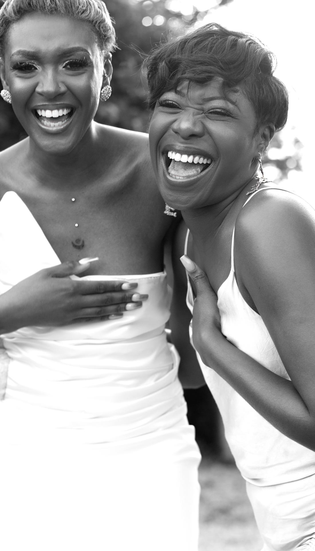 a portrait of two best friends laughing. Professional photography in Birmingham