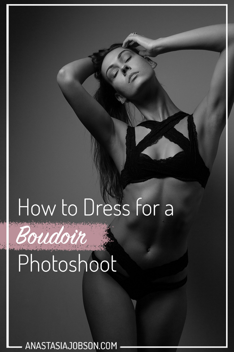 Woman wearing a black lingerie set is posing for boudoir photos. Text saying how to dress for a boudoir photoshoot