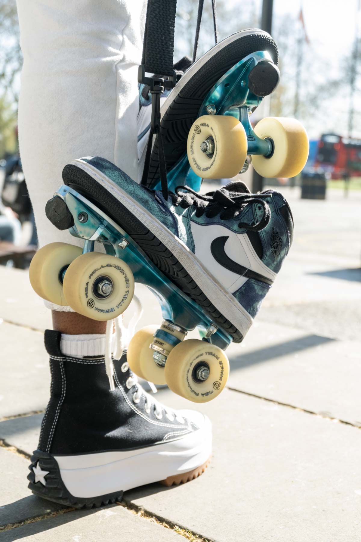 a photo of customised Nike shoes turned into roller skates