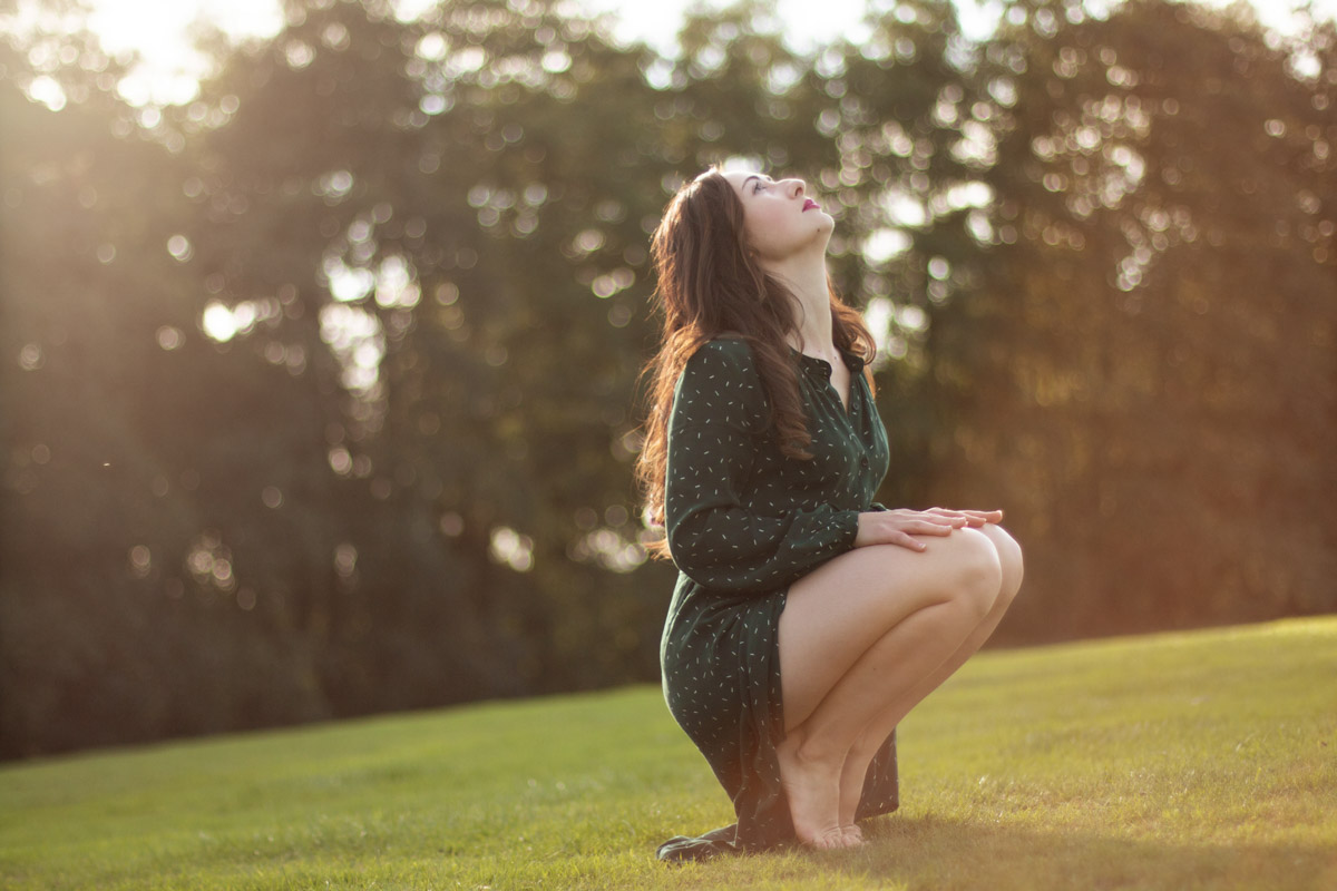 outdoor portrait photoshoot in the field with a female dancer