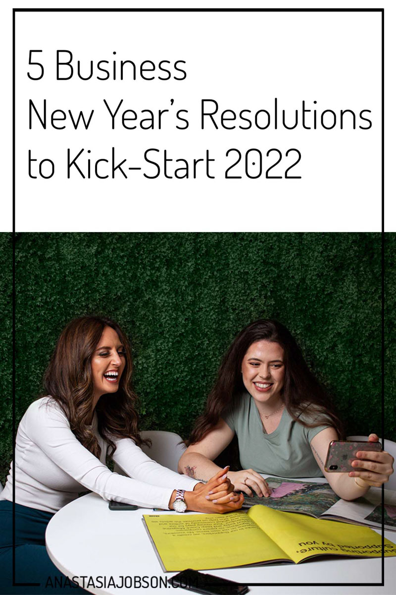 Social media managers taking a selfie. Text saying - Business new year's resolutions to kick-start 2022.