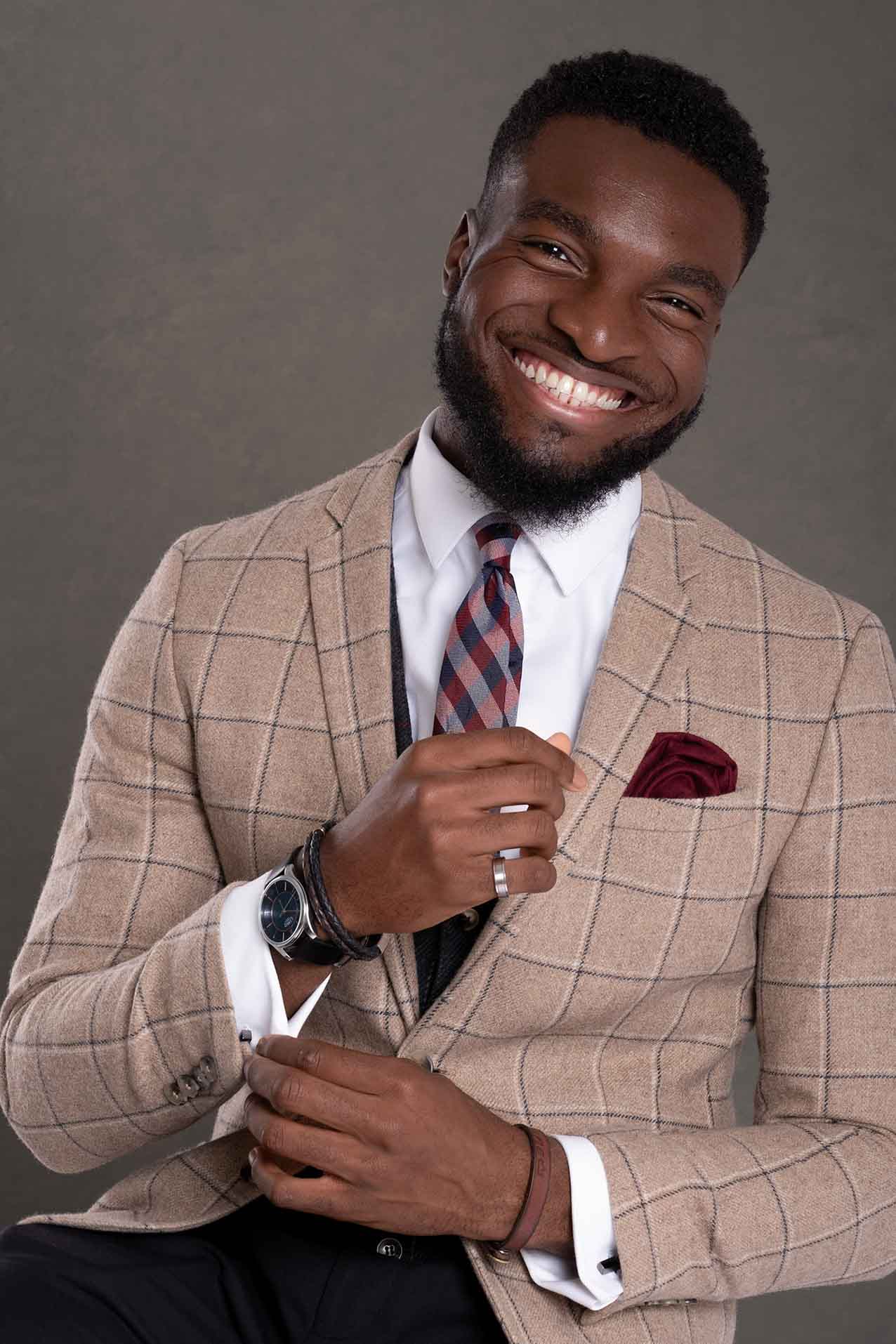 magazine style business portrait of a man smiling