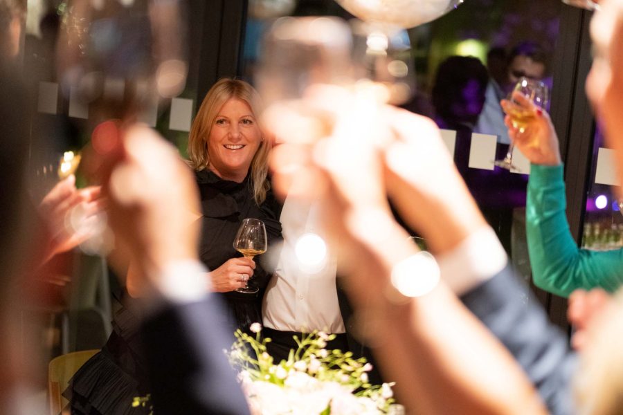 birthday party event photography, everyone is raising glass
