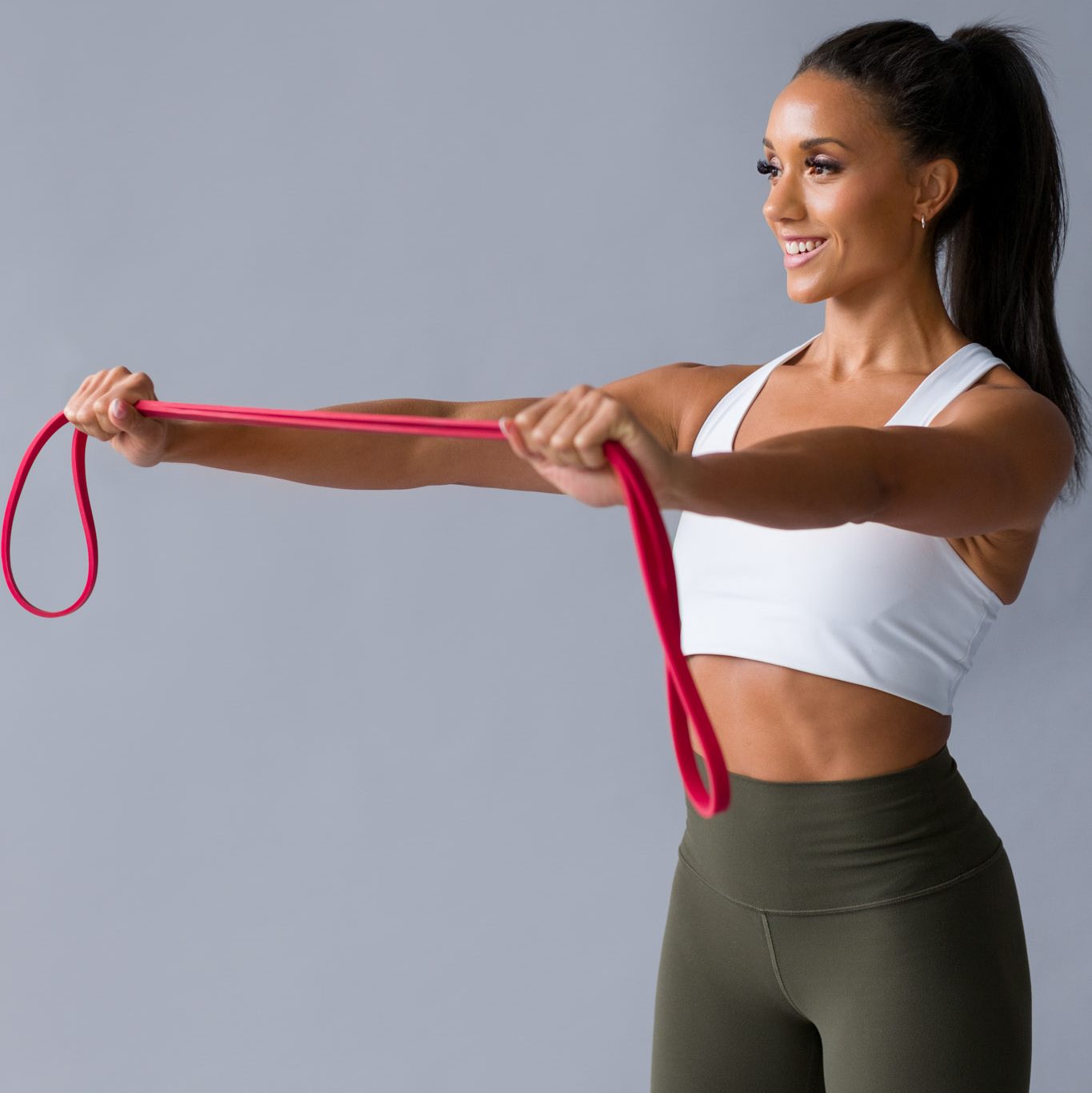 branding portrait of a female fitness coach smiling