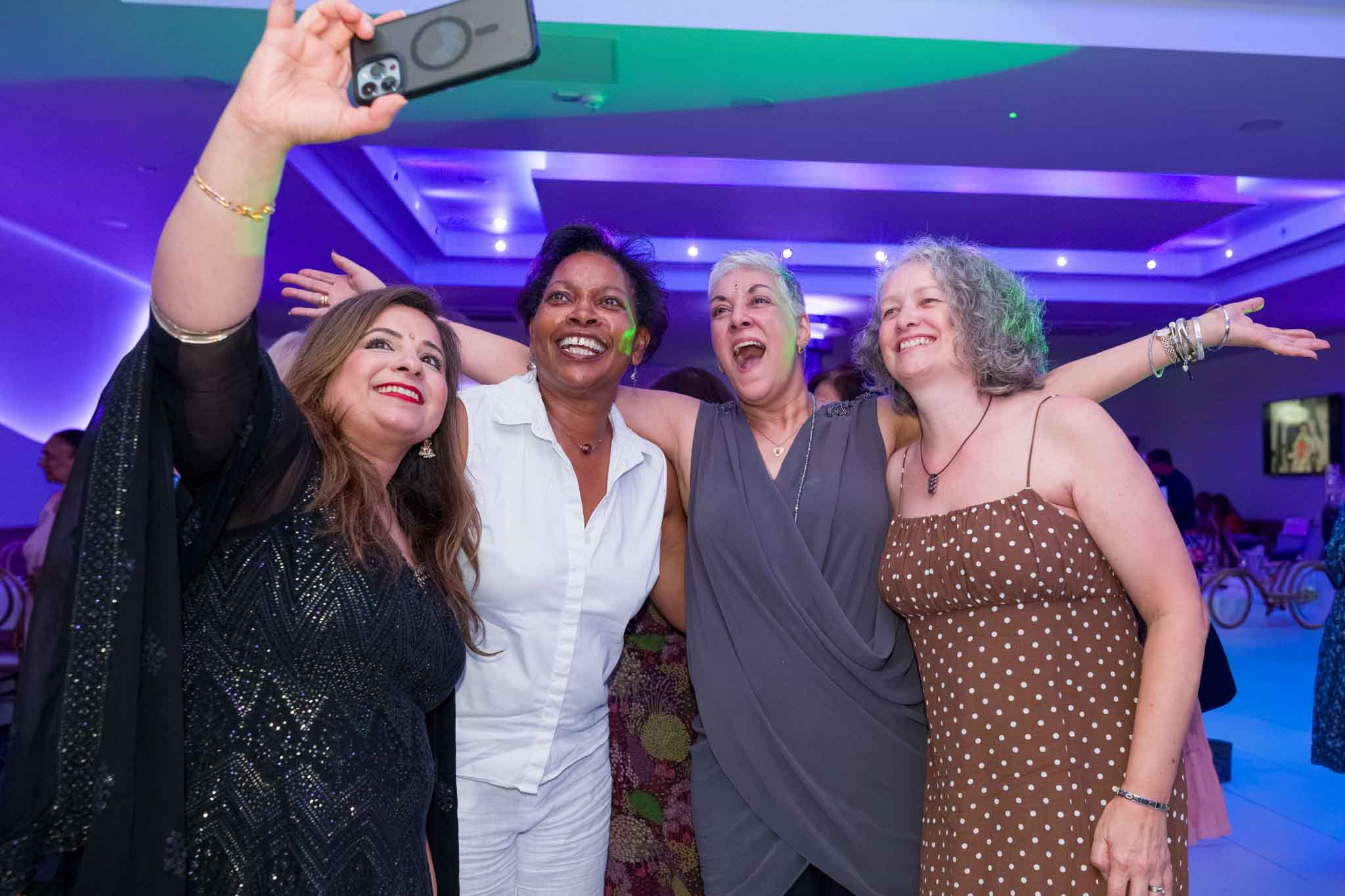 birthday party event photography, a group of friends posing for a selfie