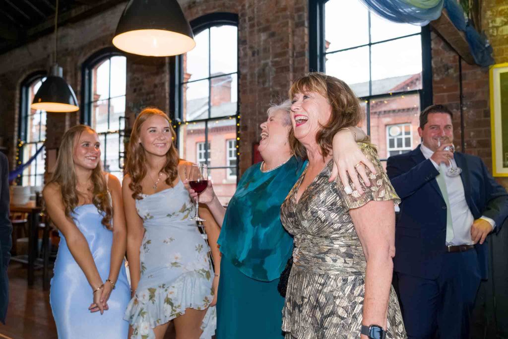 family event photography, a group of women laughing