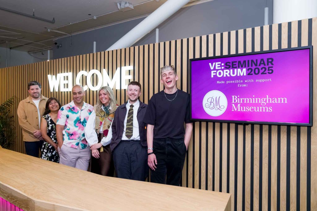 corporate event photography, organisers team is welcoming guests